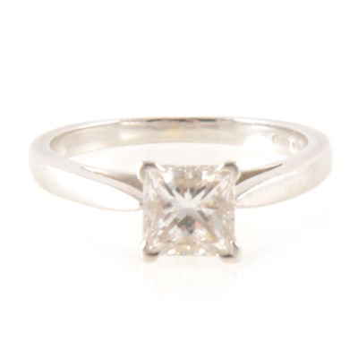 Lot 244 - A princess diamond solitaire ring.
