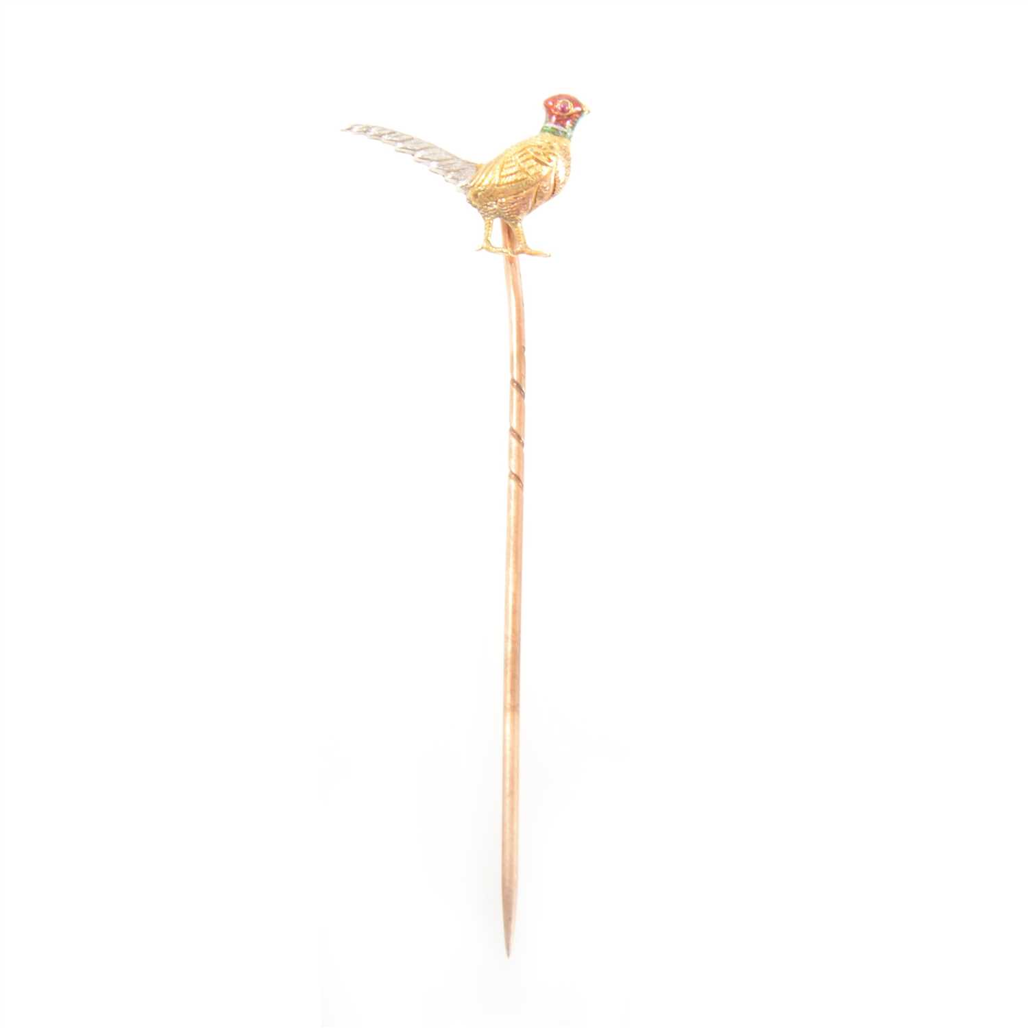 Lot 377 - A yellow and white metal pheasant stick pin.