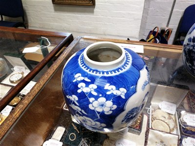 Lot 9 - A pair of Chinese blue and white ginger jars and covers.