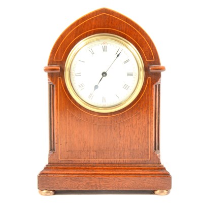 Lot 274 - An Edwardian mahogany lancet shaped mantel clock