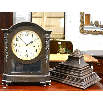 Lot 298 - An Edwardian dark oak bracket clock, Camerer, Cuss & Co., ...