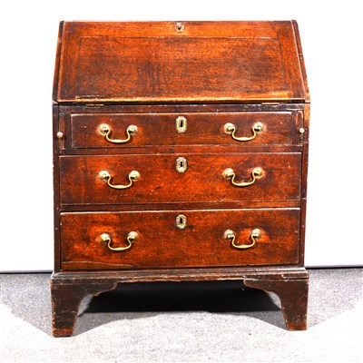 Lot 673 - George III oak bureau