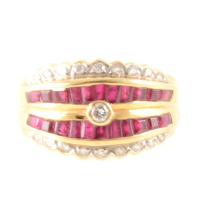 Lot 258 - A ruby and diamond multi stone dress ring.