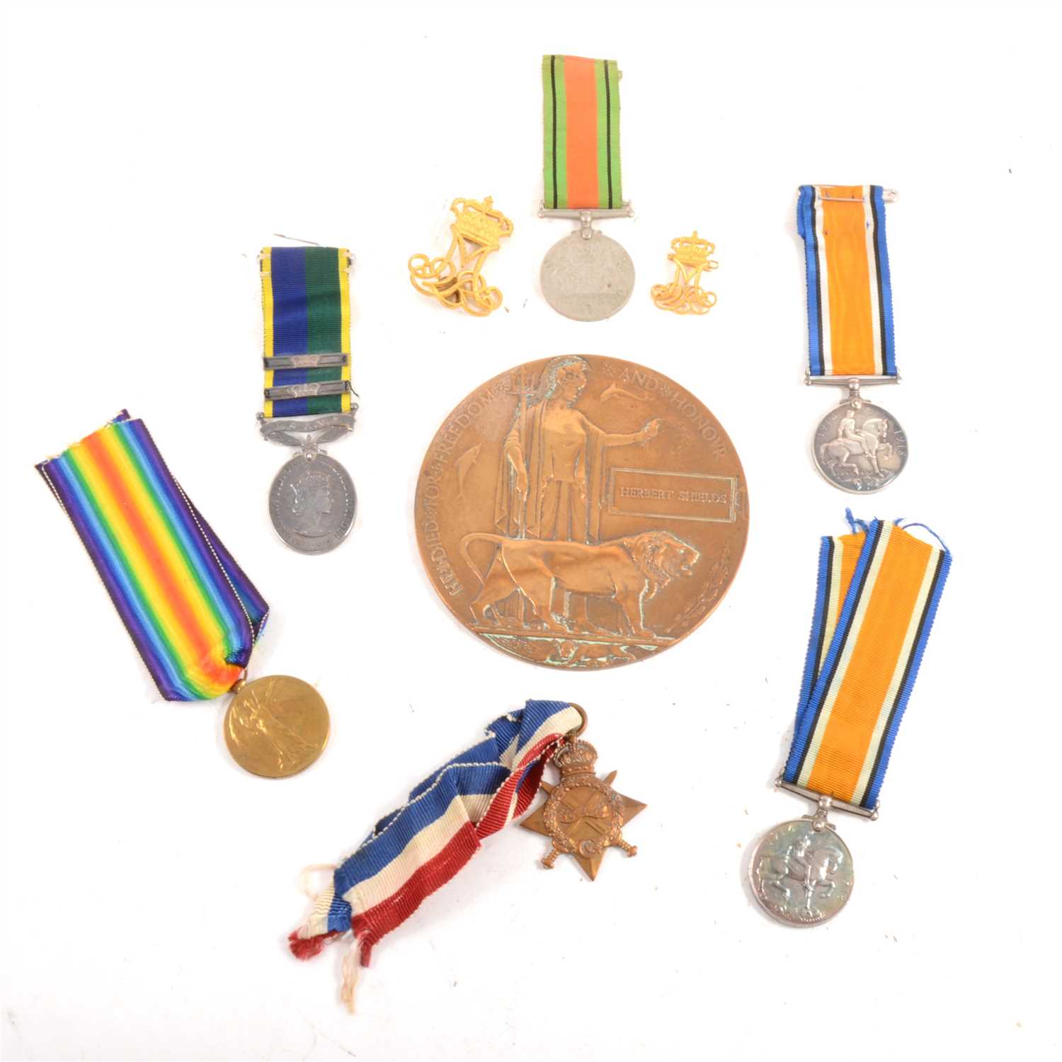 Lot 202 - A collection of First and Second World War Medals, a memorial plaque to Herbert Shields and a Princess Mary Christmas tin.