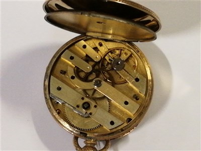 Lot 428 - An 18K open face pocket watch