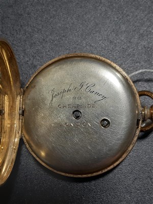 Lot 428 - An 18K open face pocket watch