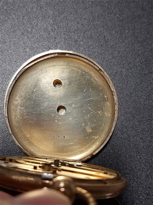 Lot 428 - An 18K open face pocket watch