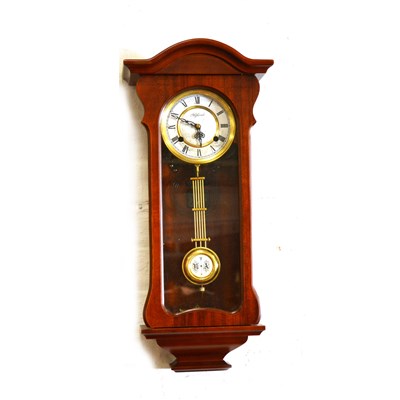 Lot 314 - A modern mahogany effect Vienna style wall clock, ...