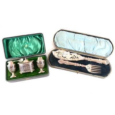 Lot 261 - A silver three piece cruet set by John Charles Lowe and a plated set of fish servers