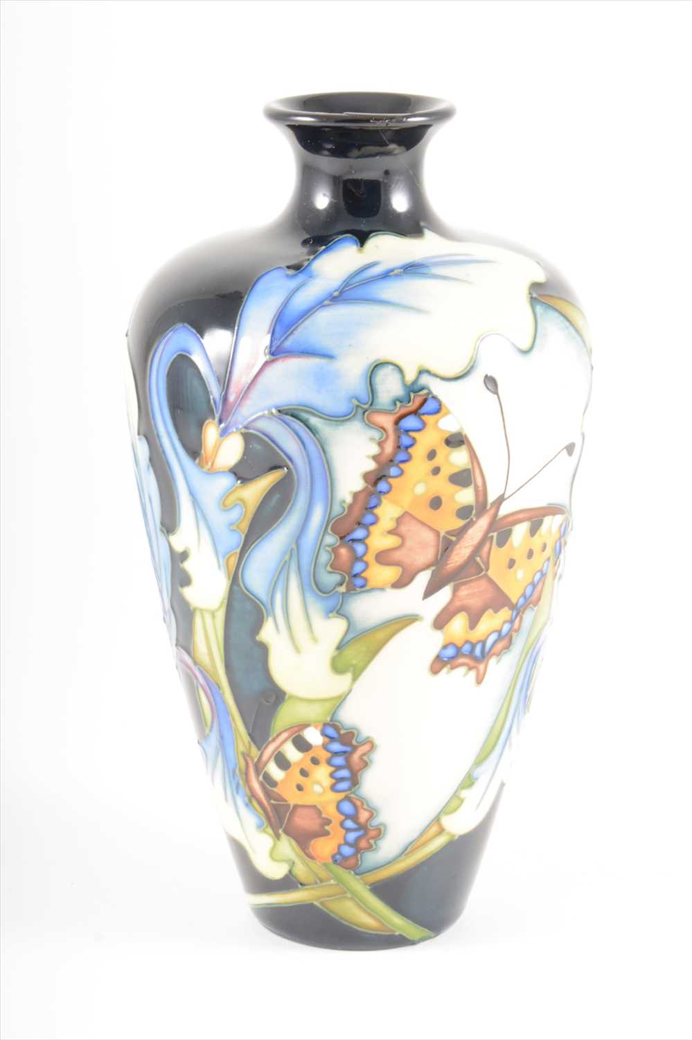 Lot 49 - A Butterfly and Iris design vase, by Moorcroft Pottery, 2007.