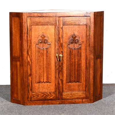 Lot 423 - A reproduction oak corner cabinet, ...