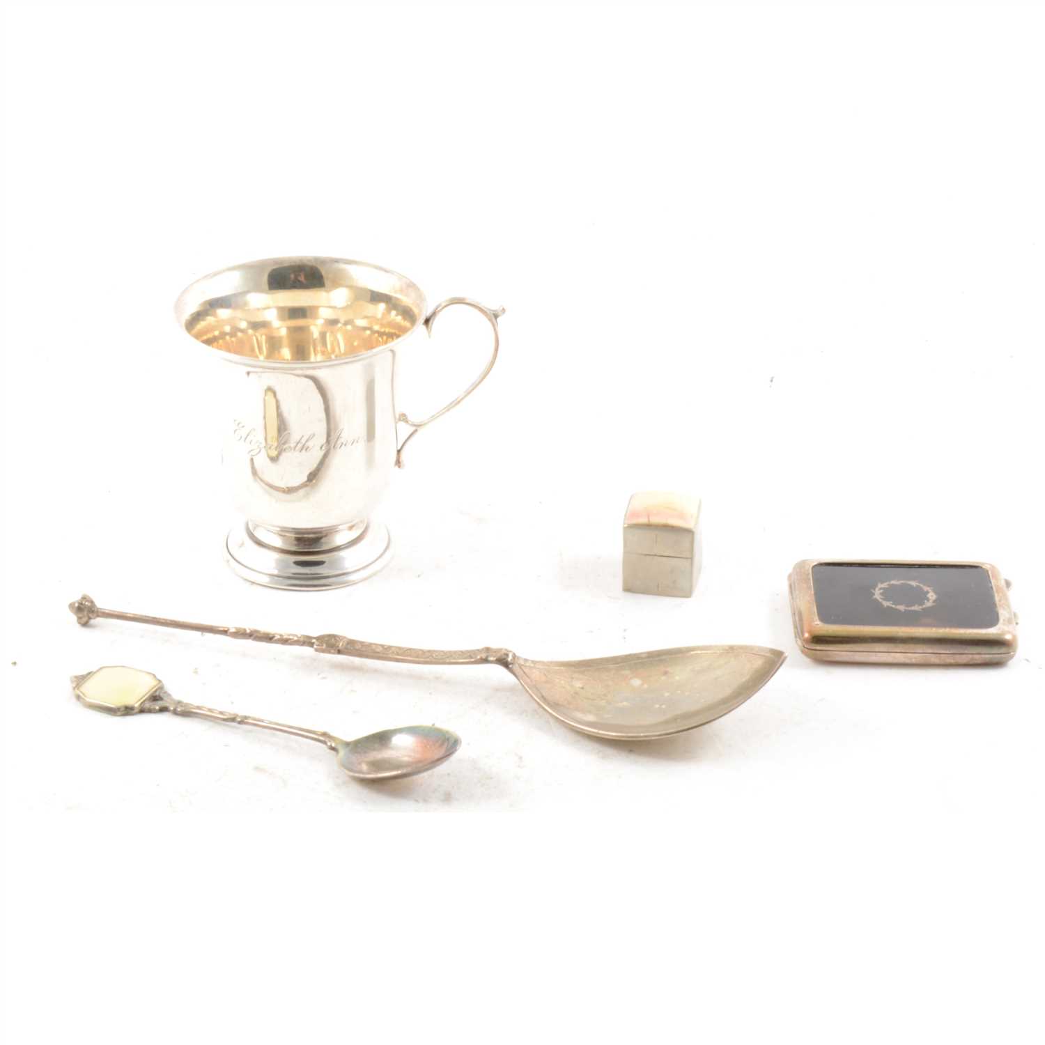 Lot 445 - A Scottish silver gilt serving spoon, small silver cup and other small silver and white metal items.