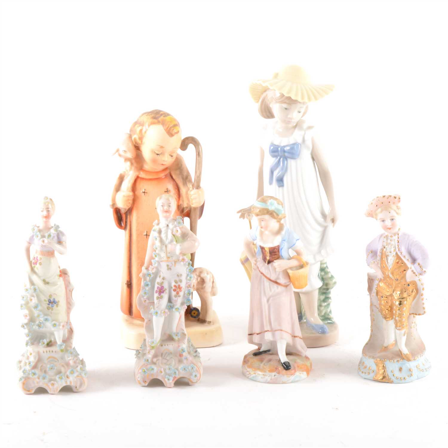 Lot 28 - A Nao figure, a girl with a parasol, ...