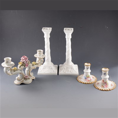 Lot 36 - A pair of Royal Worcester plain white candlesticks, ...