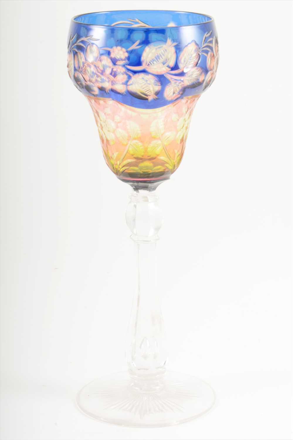 Lot 107 - A triple-cased intaglio cut glass, by Stevens and Williams, early 20th century.