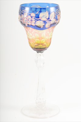 Lot 107 - A triple-cased intaglio cut glass, by Stevens and Williams, early 20th century.