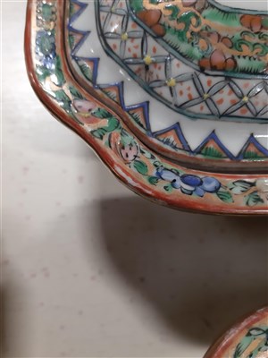 Lot 191 - A modern Chinese Canton style dinner service, decorated in famille rose enamels.