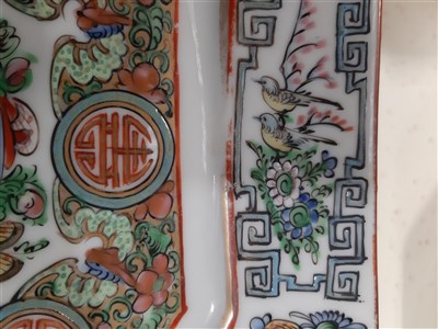 Lot 191 - A modern Chinese Canton style dinner service, decorated in famille rose enamels.