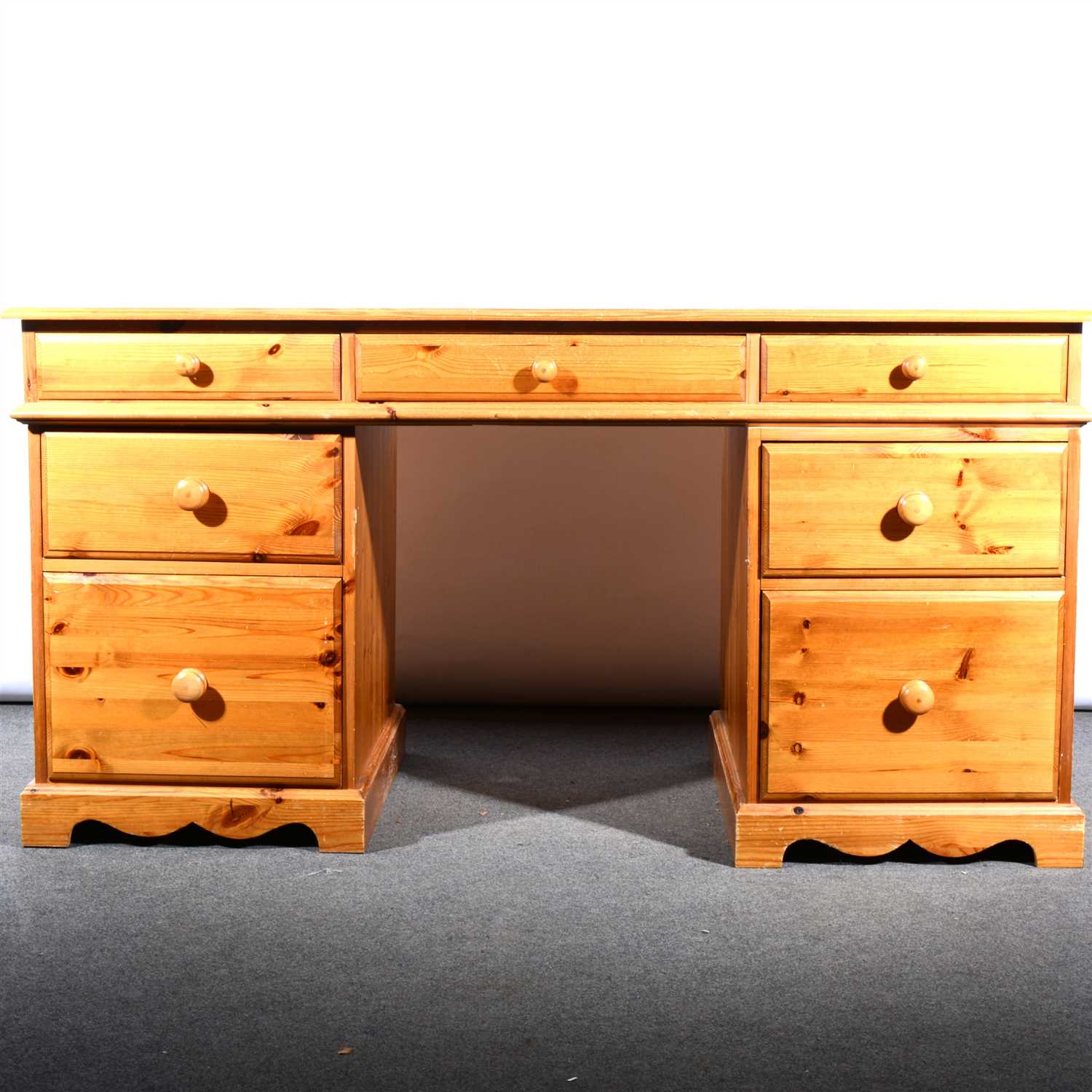 Lot 576 - A modern pine twin pedestal desk, ...