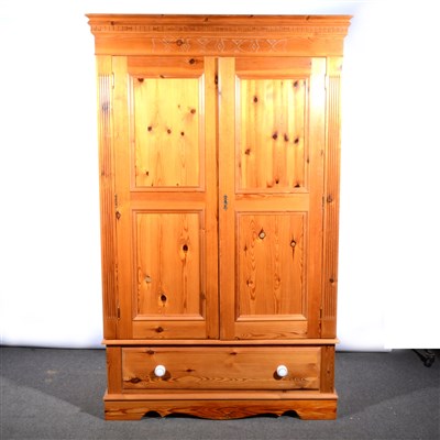 Lot 655 - A matched pine three-piece bedroom suite