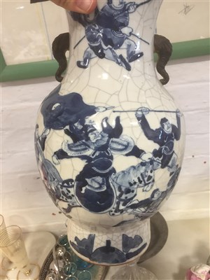 Lot 126 - A pair of Chinese crackle glaze blue and white vases, ...