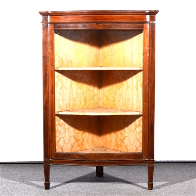 Lot 642 - An Edwardian inlaid mahogany serpentine front corner display cabinet