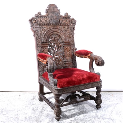 Lot 520 - Carved oak baronial-style chair