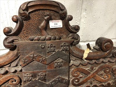 Lot 520 - Carved oak baronial-style chair