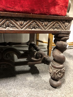 Lot 520 - Carved oak baronial-style chair