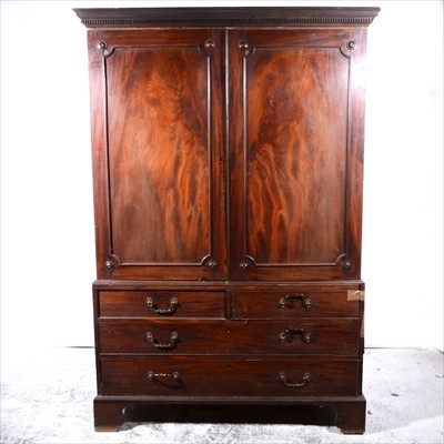 Lot 395 - George III mahogany press cupboard