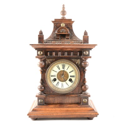 Lot 88 - A German stained wood mantel clock, ...