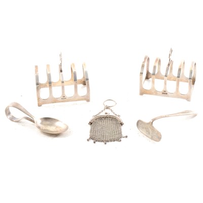 Lot 443 - A pair of silver toast racks, a silver pusher and spoon and a small silver mesh purse.