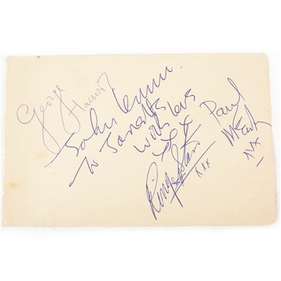 Lot 635 - The Beatles signatures; a full set of all four members John Lennon, Paul McCartney, George Harrison and Ringo Star, on one page from an album