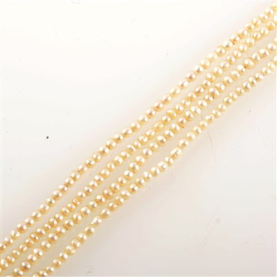 Lot 407 - A seed pearl necklace with diamond clasp.