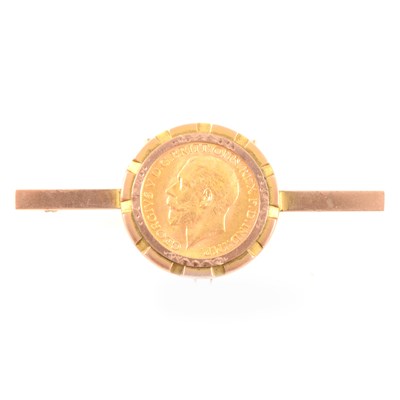 Lot 229 - A Full Sovereign brooch, George V 1915 in a yellow metal bar mount