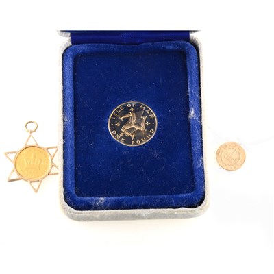 Lot 238 - A George III 1/3 1802 Guinea in a yellow metal star design pendant mount.