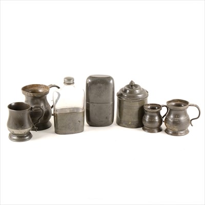 Lot 206 - A Victorian pewter tobacco box, 13cm; pewter measures, etc