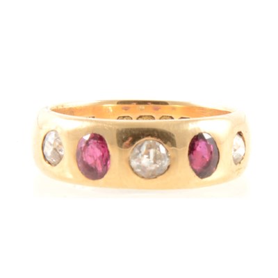 Lot 259 - A ruby and diamond five stone ring.