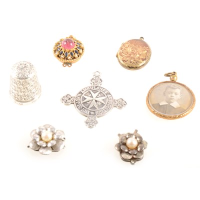 Lot 394 - A box of assorted jewellery, across set with a diamond and four emeralds., fasteners etc thimble.