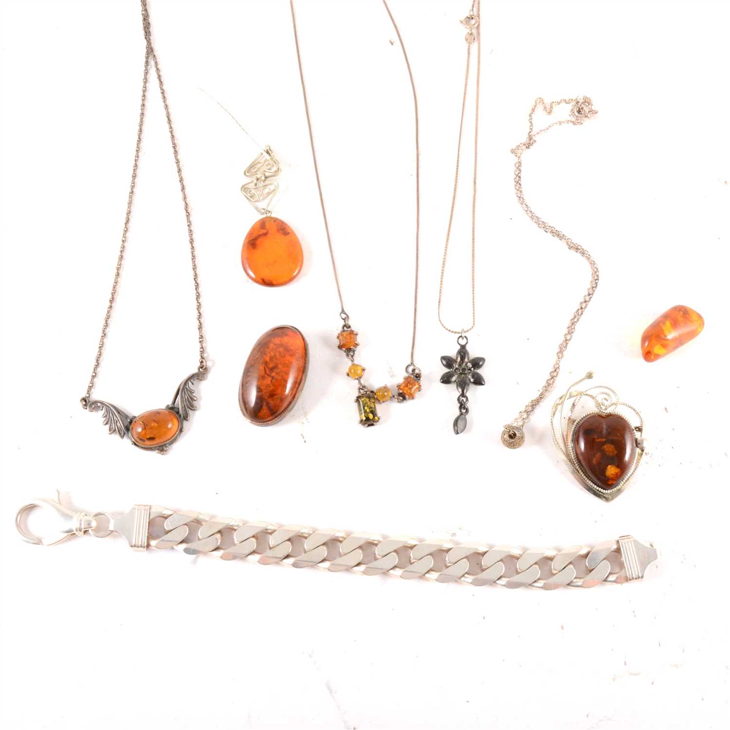 Lot 269 - A small collection of white metal and modern amber jewellery