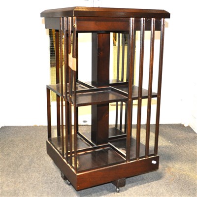 Lot 554 - A mahogany and inlaid revolving bookcase