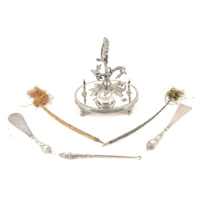 Lot 168 - A silver-plated desk stand with two old pens, plus two silver-handled shoe horns and a buttonhook.