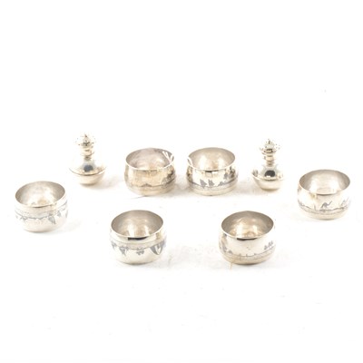 Lot 451 - A pair of silver condiments and six niello napkin rings.