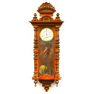 Lot 302 - A walnut and Vienna wall clock by Gustav...