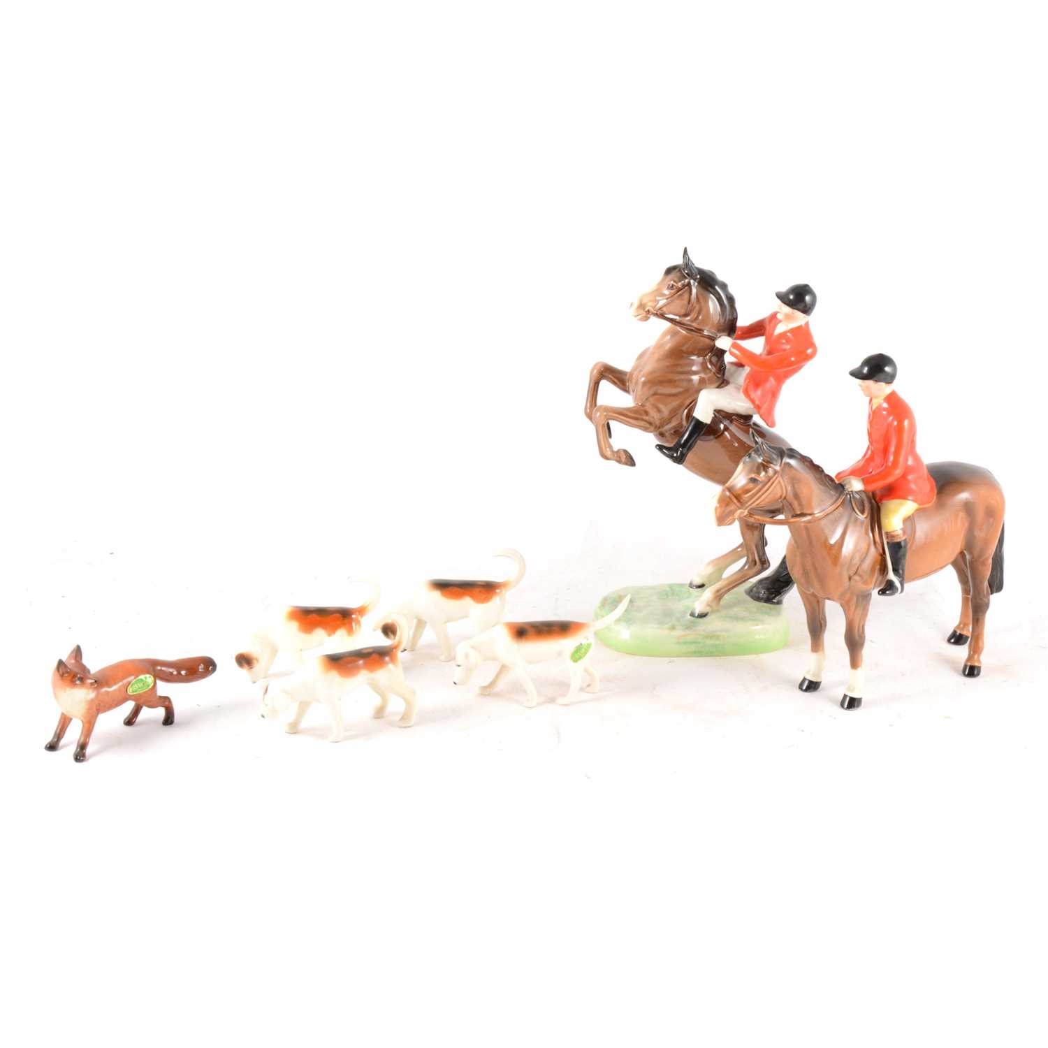 Lot 76 - Beswick, two hunstman, four hounds, and a fox