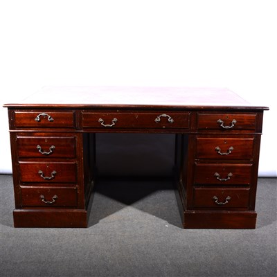 Lot 612 - A reproduction stained mahogany twin pedestal desk, ...