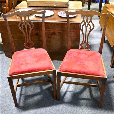 Lot 407 - Pair of Georgian style mahogany dining chairs, shaped cresting, pierced vase splats, drop in seats, square tapering legs joined by stretchers, width 48cm.