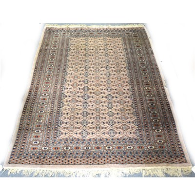 Lot 494 - A Bokhara rug, fawn ground, trellis pattern field, ...