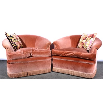 Lot 616 - A pair of pink dralon tub chairs, ...