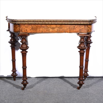 Lot 526 - A Victorian figured walnut and gilt metal mounted card table, ...